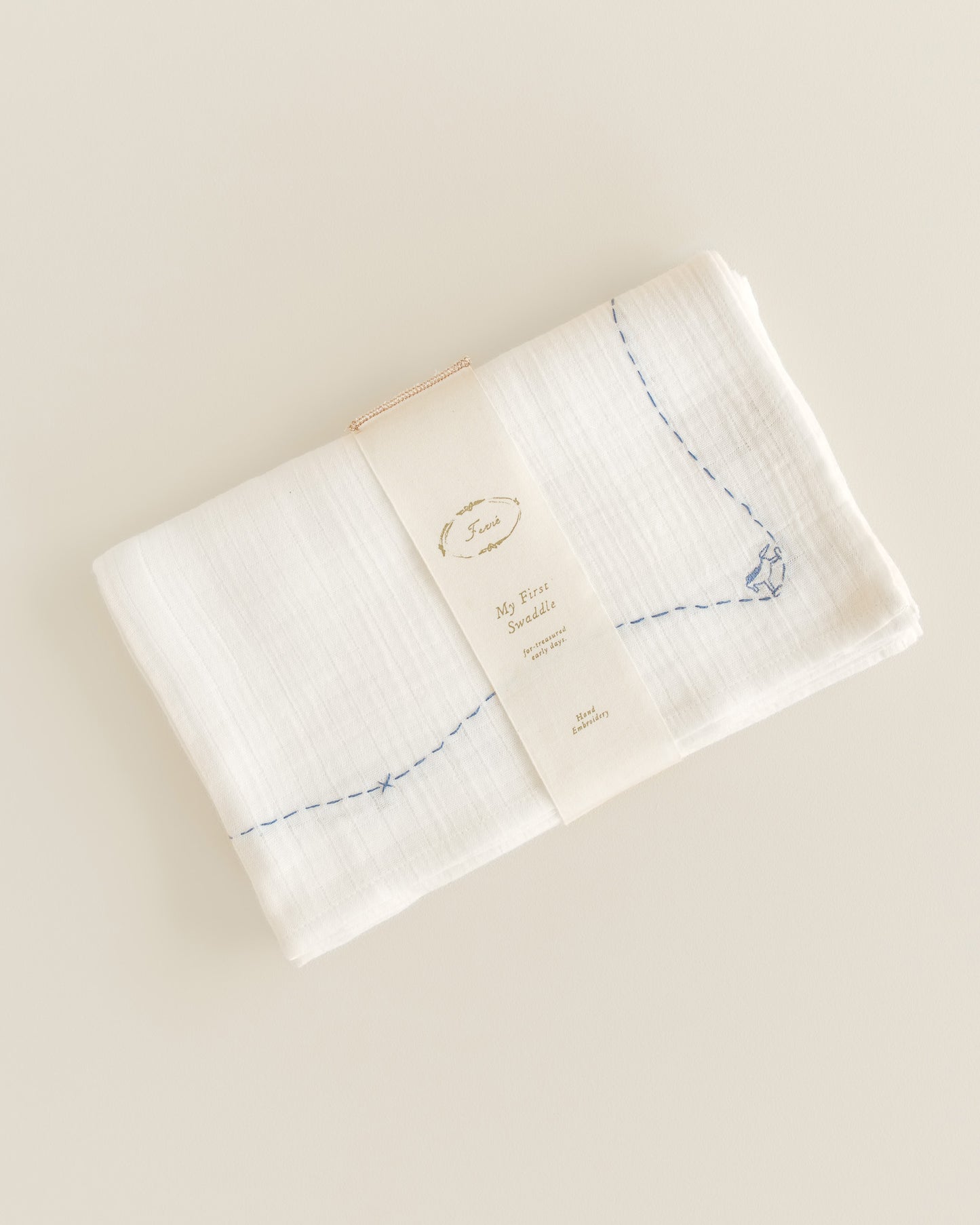 embroidered swaddle - rocking horse