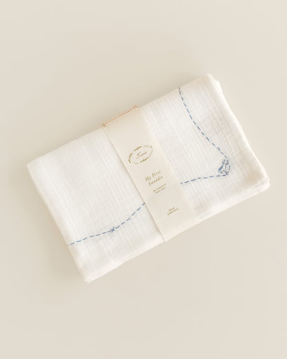 embroidered swaddle - rocking horse