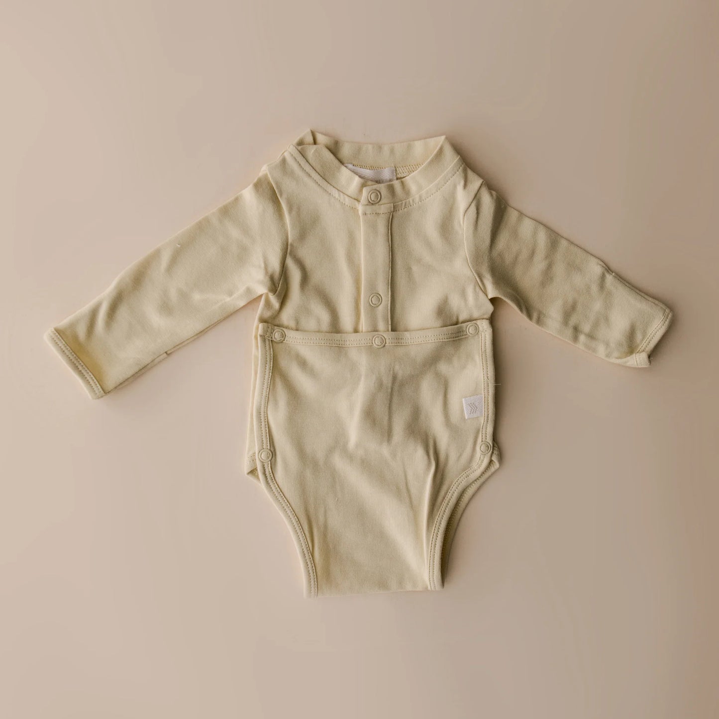 front flap onesie | buttercream